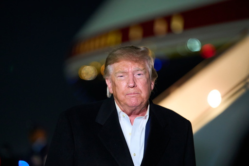 The Latest: Trump pushing to keep red-state Senate seats in GOP hands