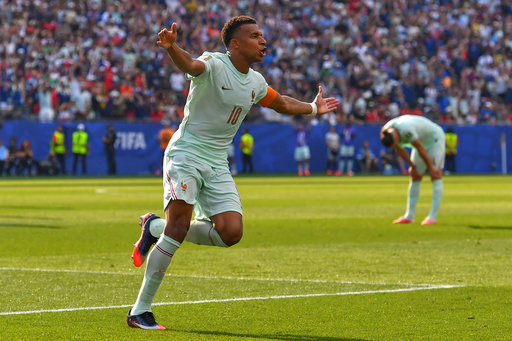 Kylian Mbappé scores his eighth goal of the World Cup, equaling Lionel Messi for the tournament lead