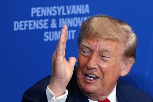 Trump drifts into campaign topics while addressing defense technology gathering