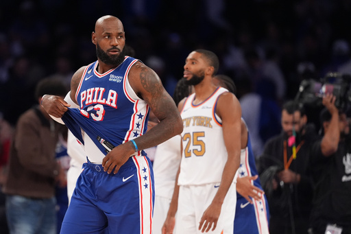 Trump blasts 76ers' star LeBron James as 'disgrace' for not standing still during national anthem