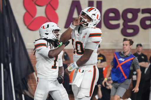 Miami's Darian Mensah is AP midseason All-America QB and UCLA puts 3 players on the first team