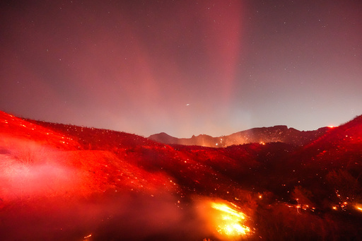 Hot, windy weather stokes brush fires in Southern California; power turned off for many