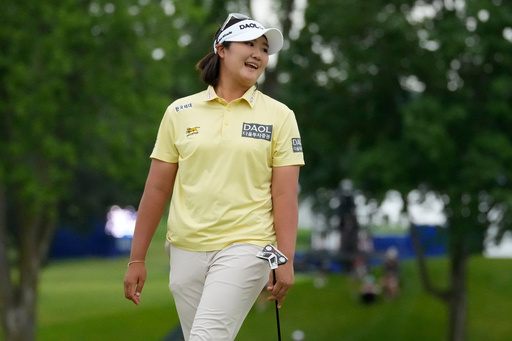 Haeran Ryu sets an LPGA major record with a 60 to build a 3-shot lead at the Evian Championship