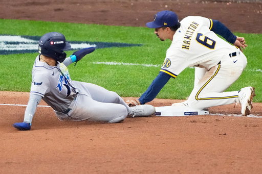 Balls glancing off gloves, runners thrown out trying to steal sink Rays in World Series opener