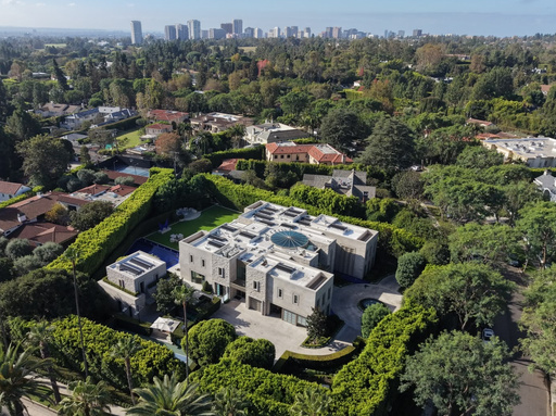 AP sources: Federal agents search Beverly Hills mansion in investigation of ex-Rep. Eric Swalwell