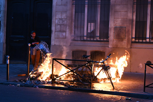Paris police issue overnight curfew in 2 areas of French capital to try to prevent further disorder