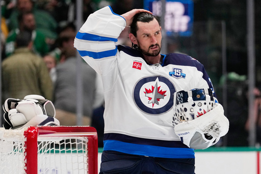 Connor Hellebuyck happy to be with the Devils after a long wait for a trade from the Jets