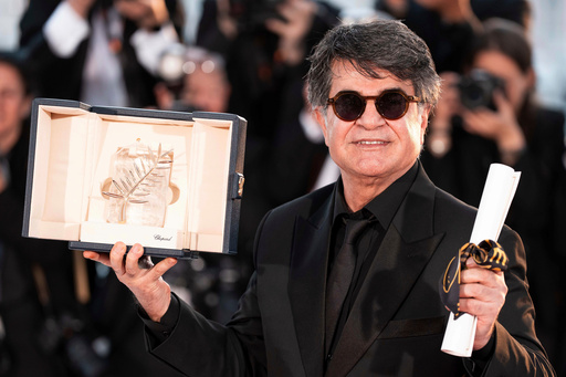 Iran sentences acclaimed film director Jafar Panahi to new prison term after his return home