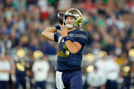 No. 4 Notre Dame overcomes sluggish start to beat Wisconsin 41-13 at Lambeau Field