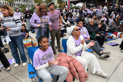 Young girls skip school with their parents to attend Valkyries' early WNBA Finals watch party