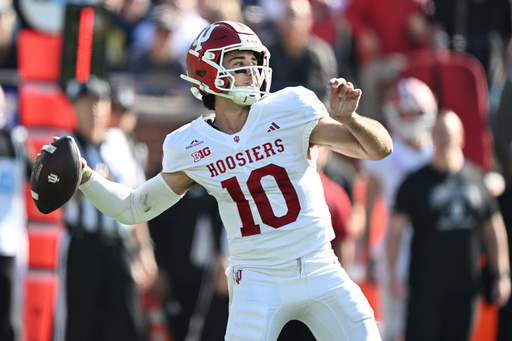 Hoover's TD run lifts No. 6 Indiana to 13-6 OT win at Michigan, its 1st win at Big House since 1967